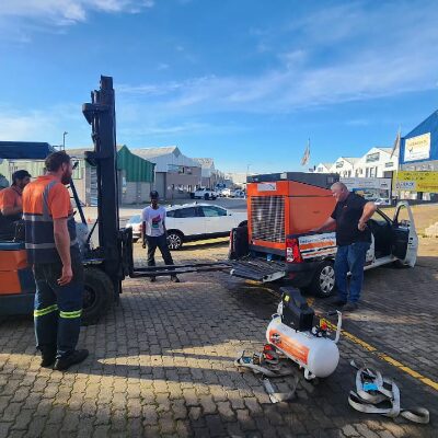 Chris out with the company vehicle dropping off equipment for a customer